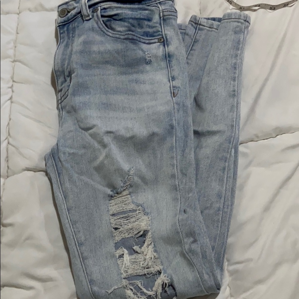 Distressed high rise jean